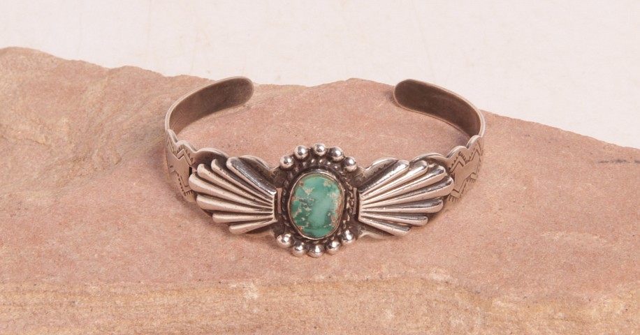 07 - Jewelry-Old, Harvey Style Navajo Bracelet: Single Green Turquoise Setting, Silver Product/Coin Silver (5.25" + 1" gap)
c. 1930-1950