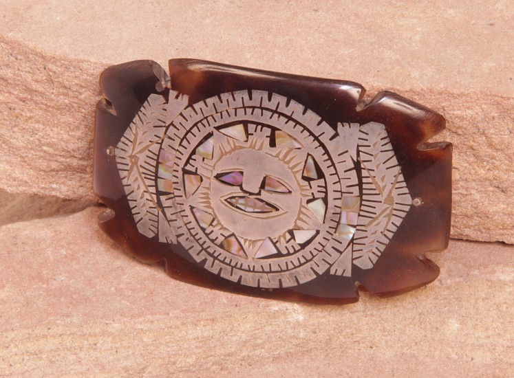 07 - Jewelry-Old, Taxco Pin by Enrique Ledesma: Tortoise Shell, Sun Motif in Silver and Mother of Pearl (1.5" x 2.5")
c. 1940