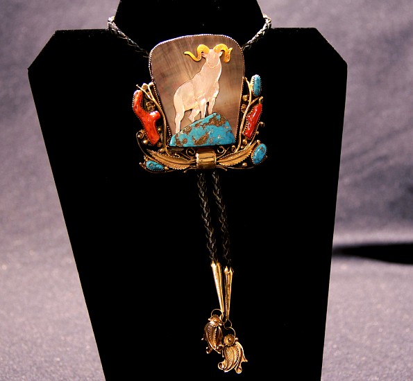 07 - Jewelry-Old, Bolo Tie by Martin Musket: Ram Motif, 14K Gold, Sterling Silver, Morenci Turquoise with Iron Pyrite Matrix, Mediterranean Ox Blood Coral
c. 1970