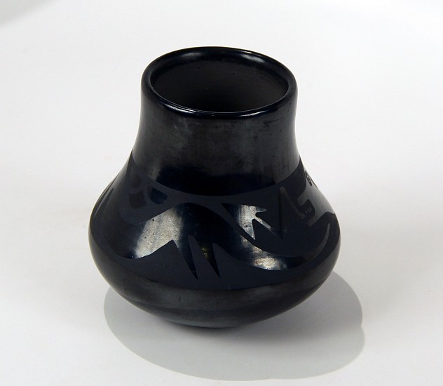 04 - Maria Martinez, Maria Family Pottery, Santana and Adam: Blackware Jar, Avanyu Motif (4.75" ht x 4.5" d)
c. 1970s, Hand coiled clay pottery
