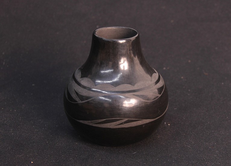 03 - Pueblo Pottery, Santa Clara Pottery: c. 1970s-80s Blackware by Earlene Youngbird Tafoya, Avanyu Motif (5" ht)
c. 1970s-80s, Hand coiled clay pottery
