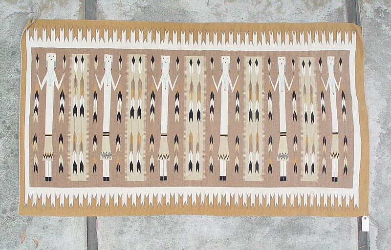 01 - Navajo Textiles, Navajo Rug: c. 1979 Yei in Soft Earth Tones, Carded Grey Field, Near Mint/Mint Condition (62" x 35")
1979, Wool
