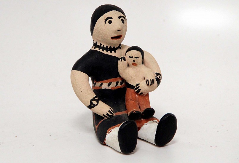 03 - Pueblo Pottery, Cochiti Pottery: c. 1970 Storyteller with Child by Seferina Ortiz (4" ht)
c. 1970, Hand coiled clay pottery
