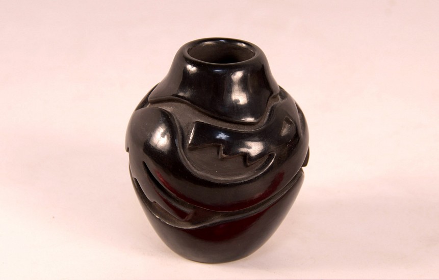 03 - Pueblo Pottery, Santa Clara Pottery: c. 1970s Blackware, Avanyu Motif (4" ht x 3.25" d)
c. 1970s, Hand coiled clay pottery