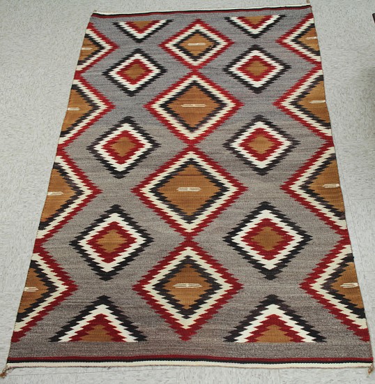 01 - Navajo Textiles, Antique Navajo Rug: c. 1920s Eyedazzler, Banded Ends, Serrated Diamond Motif, Grey Field (43" x 74") Excellent condition
c. 1920s, Handspun wool